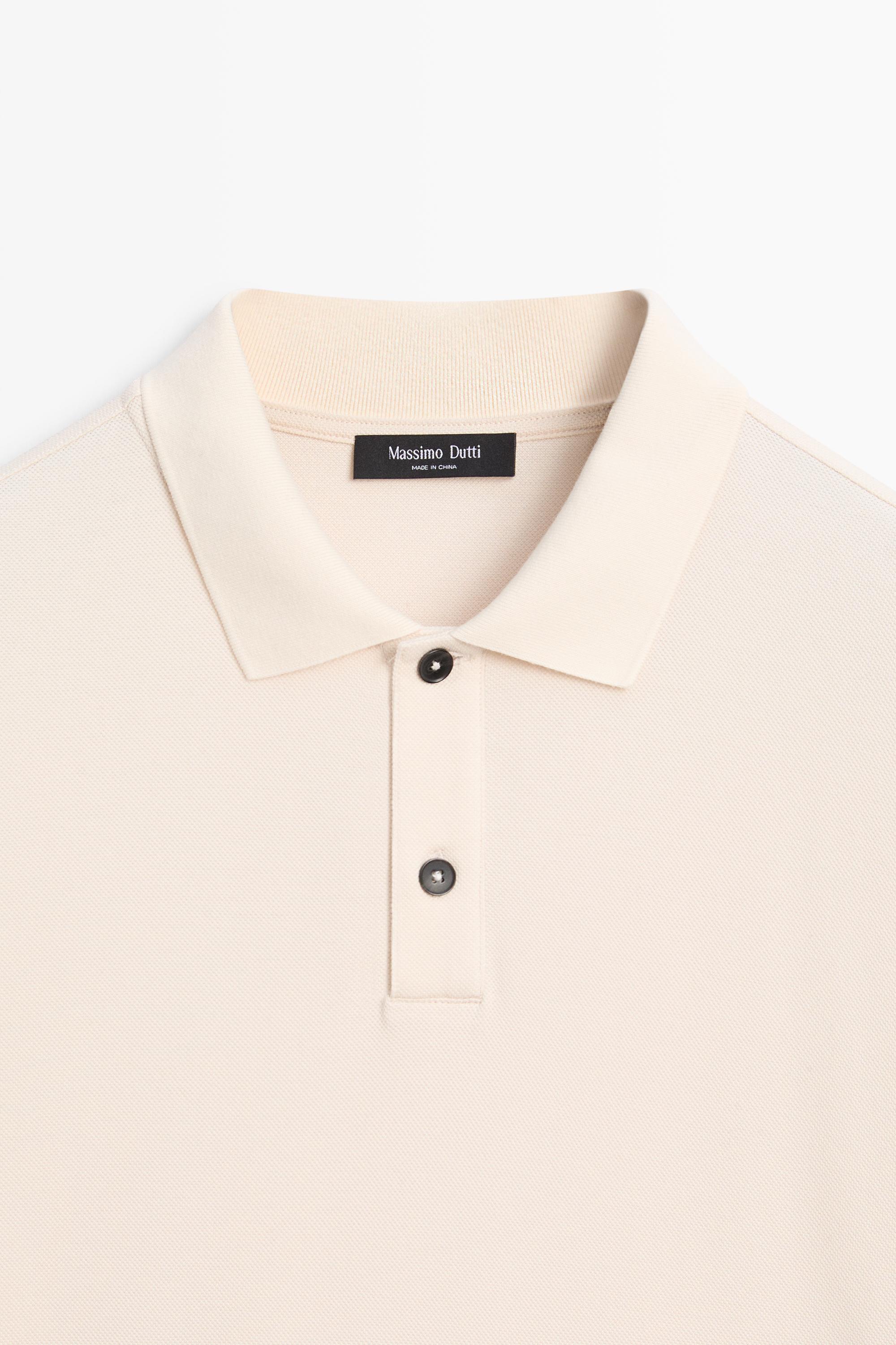100% cotton micro-textured knit polo shirt
